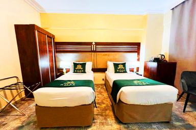 Comfortable Bedroom In Hotel